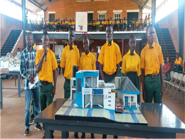 Second place winners from Division 44 demonstrating their project at the competition Second place winners from Division 44 demonstrating their project at the competition