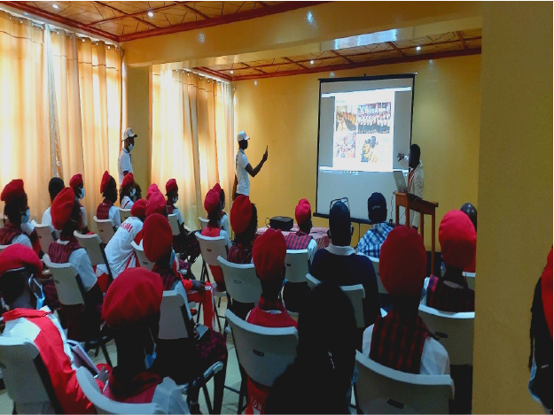 Firestone Liberia’s Communications Manager Patrick Honnah provides a company overview presentation to the students